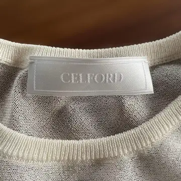 CELFORD 아이보리 플레어 반팔 상의
