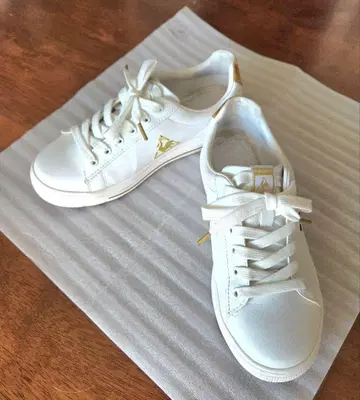 르꼬끄 스포르티프 화이트 스니커즈