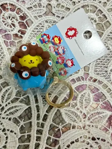 [미사용 새상품] EXPO2025 산리오 미야쿠미야쿠 키링 푸딩