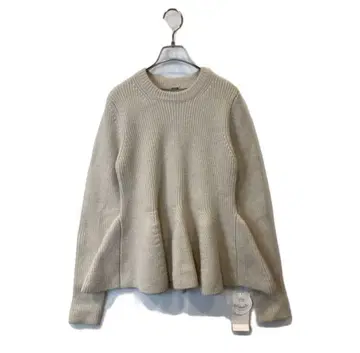 미라 오웬 페플럼 베이지 플레어헴 긴팔 니트