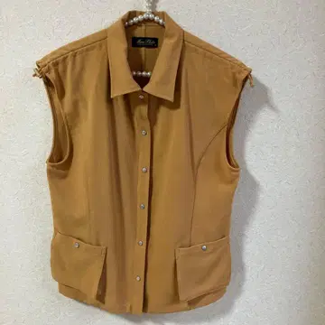 레리안 베스트 카키색