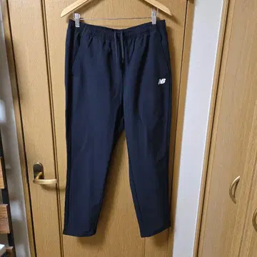 New Balance 우븐 팬츠