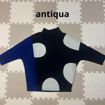 antiqua 돌먼 슬리브 도트 무늬 절개 니트