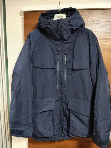 유니클로 x 화이트 마운티니어링 하이브리드 다운 오버사이즈 파카