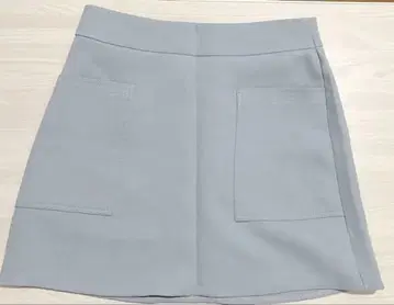 새상품급 포켓 부착 미니 스커트 스카이블루