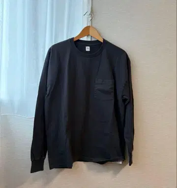 캡틴 선샤인 블랙 긴팔 티셔츠 포켓 부착