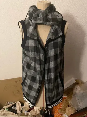 체크 무늬 슬리브리스 베스트