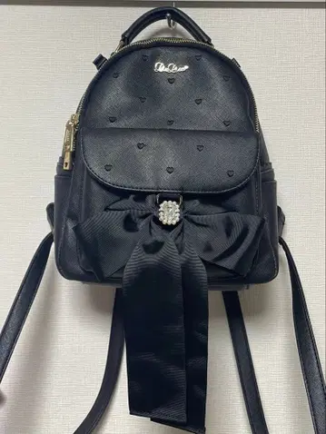 리본 포함 블랙 백팩