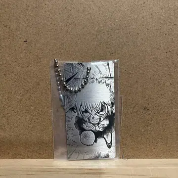 골드 컬러의 갓슈 DMM 복권 메탈 키링 1