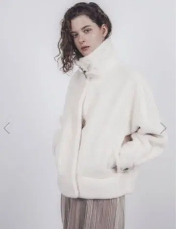 스터닝 루어 에코 무스탕 숏 자켓