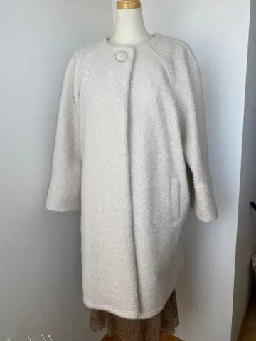 아이보리 코트 스페치오