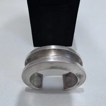 parts of four CRESCENT CHANNEL BRACELET