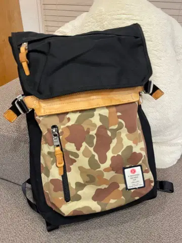 ASSOV 카모플라쥬 롤탑 백팩