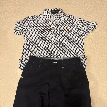 르꼬끄 골프웨어 파도 무늬 셔츠와 블랙 팬츠 세트