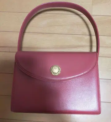 핑크 핸드백 골드 컬러 버튼