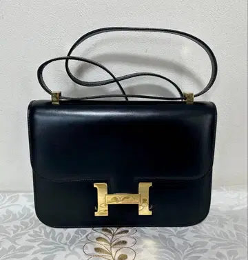 [레어] EPONINE 가죽 H 로고 금장 장식 숄더백