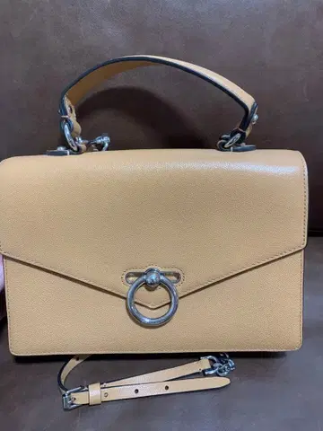 베이지 핸드백 합성 피혁