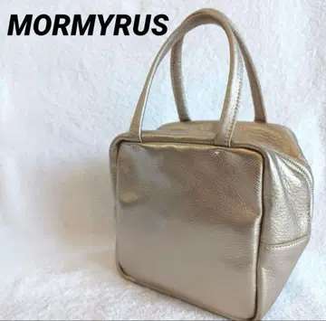 MORMYRUS 모밀스 큐브 레더백 골드