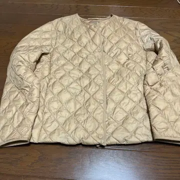 베이지 퀼팅 자켓 수납 봉투 포함