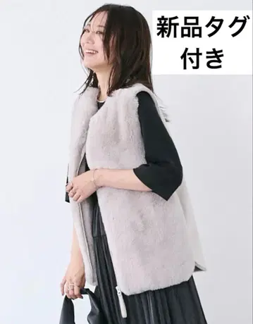 택 포함 새상품 kuih 쿠이 에코 퍼 무스탕 베스트