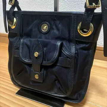 헌팅월드 숄더백 미니 나일론 사선 애나멜 로고