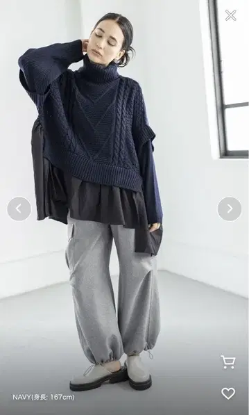 오스모시스 터틀넥 절개 무늬 니트 풀오버