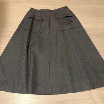 폭시 그레이 플레어 스커트 포켓 부착