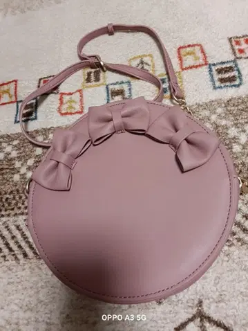 마이멜로디 리본 포함 원형 숄더백 핑크