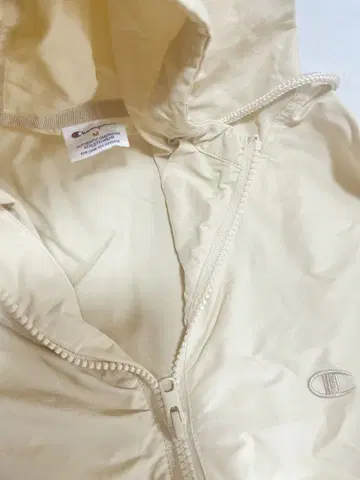 챔피온 하프 지퍼 패커블 자켓