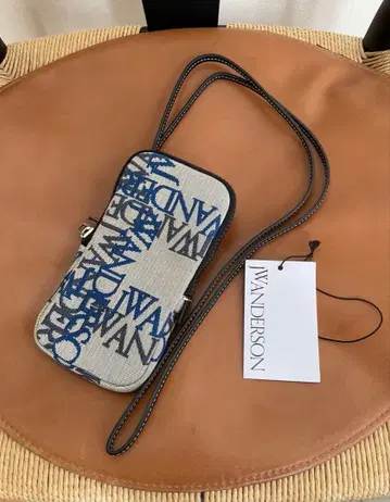 JW ANDERSON 로고 그리드 캔버스 포니 파우치