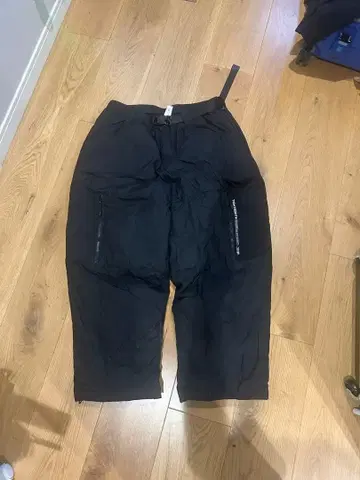 TIGHTBOOTH 블랙 다운 팬츠