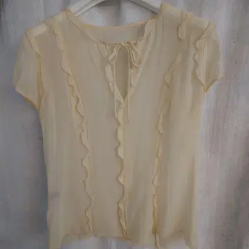 DKNY 연한 옐로우 컬러에 핑크 비즈 포함 실크 100% 반팔 블라우스