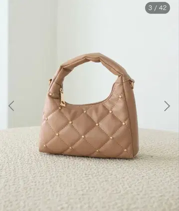 스터드 퀼트 백 어스 뮤직 앤 이콜로지 라이트 브라운