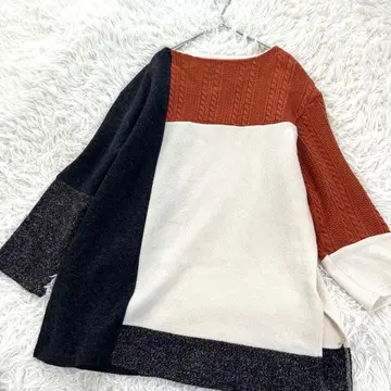 팔 컬렉션 울 혼방 이소재 절개 니트 오버 사이즈 풀오버