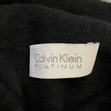 캘빈 클라인 플래티넘 슬리브리스 스웨터