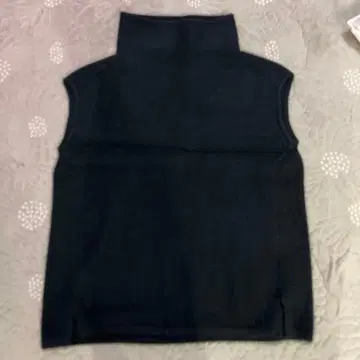 캘빈 클라인 플래티넘 슬리브리스 스웨터