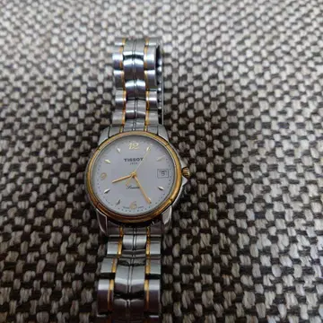 TISSOT 아날로그 손목시계 실버/골드