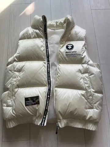 AAPE NOW 다운 베스트 아이보리