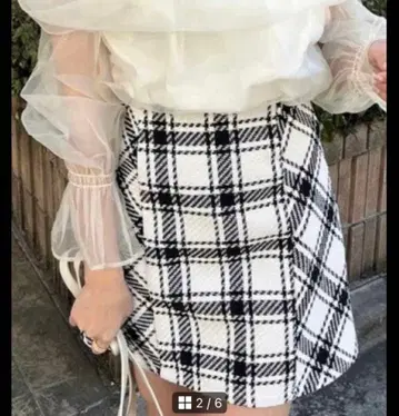 NICE CLAUP 백리본 체크 미니 스커트