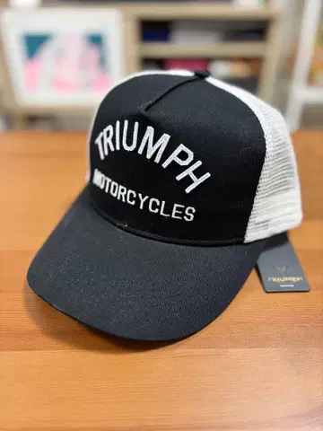Triumph 코스트 캡