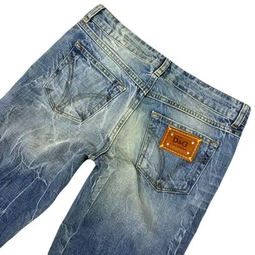 돌체앤가바나 데님 팬츠 데미지 가공 DG 플레이트 플레어 팬츠