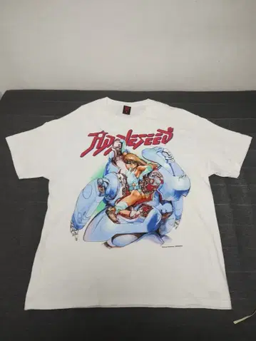 긱스룰즈 시로 마사무네의 세계전 애플 시드 콜라보 T셔츠