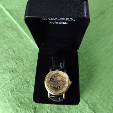 ON RICE FIELD 수동 와인딩 시계 골드/블랙