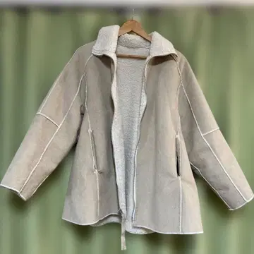 차오패닉 티피의 리버서블 무스탕 코트