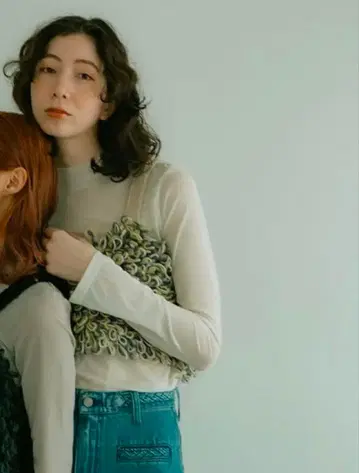 pur/ loop hand knit top 뷔스티에