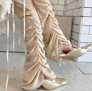 25: Pellicule glitter film sheer pants