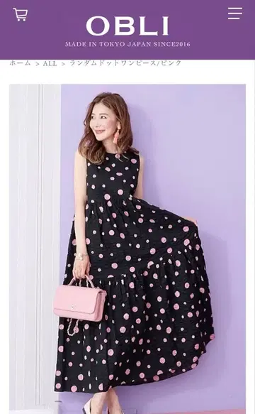 OBLI 오블리 플레어 스커트 블랙 베이스에 핑크 물방울 패턴