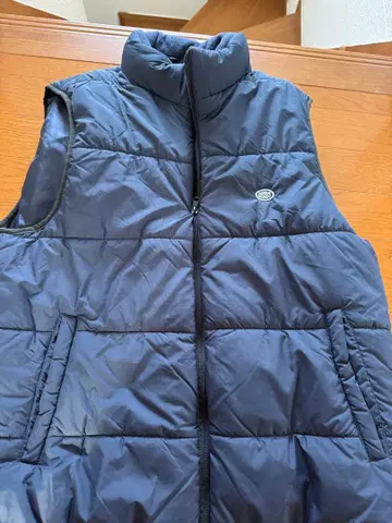 DISCUS 네이비 슬리브리스 베스트