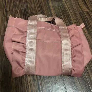 구치오 핑크 토트백 금장 장식 포함