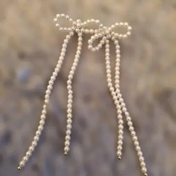 새상품급 유나이티드 애로우즈 P/PL 리본 귀찌